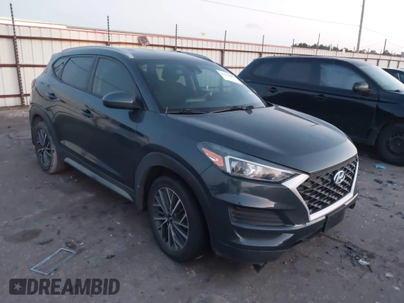 2019 Hyundai Tucson Sport with VIN KM8J33AL7KU901296, listed as a IAAI auction lot 41132884 with 76,948 mi miles. Bid and sale history available at carsss.com. Image 1.