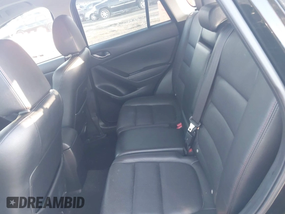 2015 Mazda CX-5 Grand Touring with VIN JM3KE4DY6F0513173, listed as a IAAI auction lot 41867030 with 93,770 mi miles. Bid and sale history available at carsss.com. Image 8.