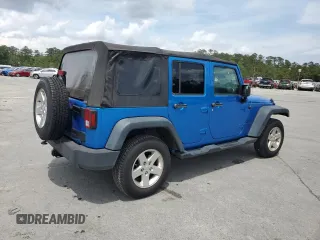 2015 Jeep Wrangler Unlimited Willys Wheeler with VIN 1C4BJWDG4FL611656, listed as a Copart auction lot 54010395 with 129,797 mi miles and Salvage Title. Bid and sale history available at DreamBid. Image 3.
