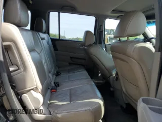 2012 Honda Pilot EX-L z VIN 5FNYF4H56CB051453, wystawiony jako Copart lot #56736035 z przebiegiem 210 201 mil mil oraz Szkoda całkowita • Salvage title. Historia ofert i sprzedaży dostępna na DreamBid. Obrazek 11.