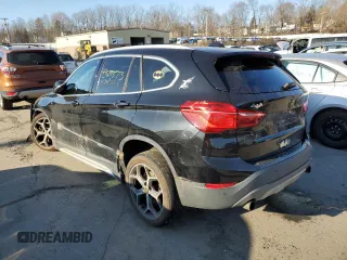 2016 BMW X1 xDrive28i with VIN WBXHT3C34GP883848, listed as a Copart auction lot 43981253 with 136,762 mi miles. Bid and sale history available at carsss.com. Image 2.