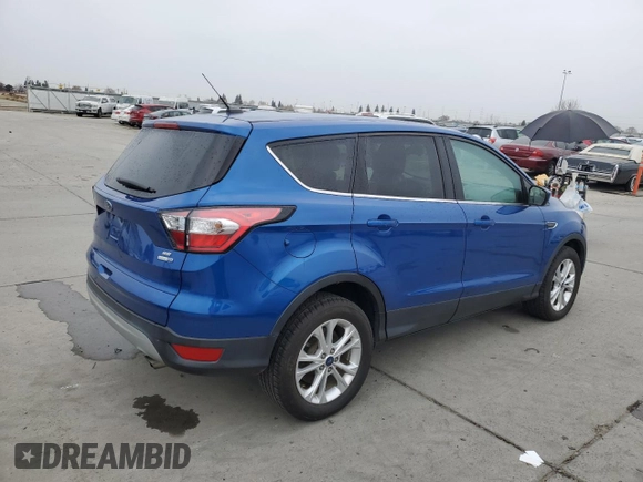 2017 Ford Escape SE with VIN 1FMCU9GDXHUC51686, listed as a Copart auction lot 84412734 with 96,234 mi miles and Clean Title. Bid and sale history available at DreamBid. Image 3.