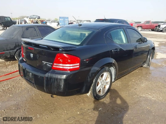 2010 Dodge Avenger R/T with VIN 1B3CC5FB3AN215209, listed as a IAAI auction lot 41676632 with 159,043 mi miles. Bid and sale history available at carsss.com. Image 4.