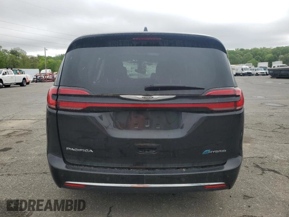 2023 Chrysler Pacifica Hybrid Limited с VIN 2C4RC1S71PR630575, выставлен на аукционе Copart как лот 55826955 с пробегом 45 381 миль миль и Списание • Salvage title. История ставок и продаж доступна на DreamBid. Изображение 6.