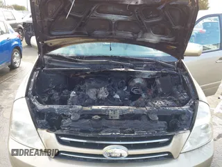 2007 Kia Sedona LX with VIN KNDMB233676171551, listed as a IAAI auction lot 40801032 with 142,581 mi miles. Bid and sale history available at carsss.com. Image 6.