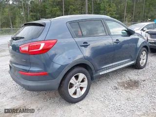2013 Kia Sportage LX with VIN KNDPB3A22D7423234, listed as a IAAI auction lot 41913072 with 165810 miles. Bid and sale history available at carsss.com. Image 4.