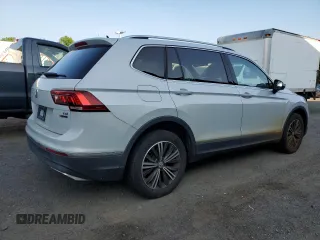 2018 Volkswagen Tiguan SEL z VIN 3VV2B7AXXJM009697, wystawiony jako Copart lot #66335425 z przebiegiem 129 117 mil mil oraz Czysty tytuł • Clean title. Historia ofert i sprzedaży dostępna na DreamBid. Obrazek 3.