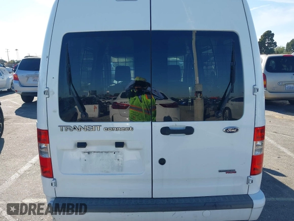 2013 Ford Transit Connect XLT z VIN NM0LS6BN7DT133925, wystawiony jako IAAI lot #41843878 z przebiegiem 120 425 mil mil oraz . Historia ofert i sprzedaży dostępna na DreamBid. Obrazek 16.