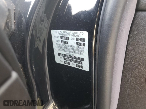 2005 Jaguar XJ Vanden Plas with VIN SAJWA82B05TG47030, listed as a Copart auction lot 41040574 with 114,520 mi miles and Salvage Title. Bid and sale history available at carsss.com. Image 13.
