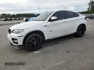 2011 BMW X6 50i with VIN 5UXFG8C51BLZ96811, listed as a Copart auction lot 75038764 with 0 mi miles and Salvage Title. Bid and sale history available at carsss.com. Image 1.