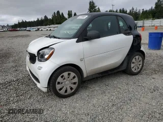 2016 Smart fortwo Passion with VIN WMEFJ5DA0GK068547, listed as a Copart auction lot 59199865 with 51,678 mi miles and Salvage title. Bid and sale history available at DreamBid. Image 1.
