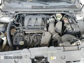 2015 Ford Taurus Limited with VIN 1FAHP2F88FG105978, listed as a Copart auction lot 60805175 with 146,278 mi miles and Salvage title. Bid and sale history available at DreamBid. Image 11.