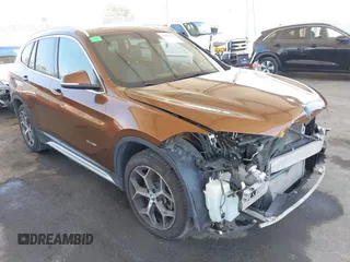 2017 BMW X1 xDrive28i with VIN WBXHT3C34H5F75885, listed as a IAAI auction lot 42655580 with 54,609 mi miles and . Bid and sale history available at DreamBid. Image 1.