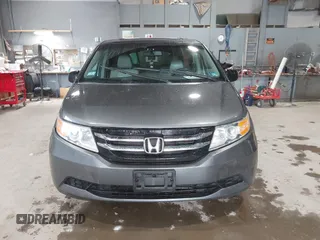2012 Honda Odyssey EX-L with VIN 5FNRL5H63CB137198, listed as a IAAI auction lot 42706690 with 305,753 mi miles and . Bid and sale history available at DreamBid. Image 12.