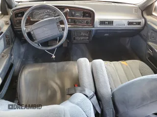 1990 Mercury Sable z VIN 1MECM5348LG630484, wystawiony jako Copart lot #45757565 z przebiegiem 98 764 mil mil oraz Szkody całkowita. Historia ofert i sprzedaży dostępna na DreamBid. Obrazek 8.