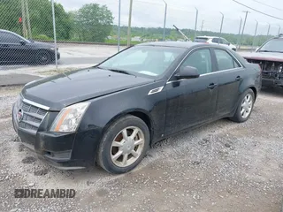 2009 Cadillac CTS RWD with VIN 1G6DF577190137609, listed as a IAAI auction lot 42196209 with 111,843 mi miles and . Bid and sale history available at DreamBid. Image 2.