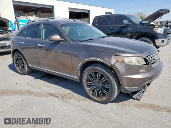 2008 Infiniti FX z VIN JNRAS08W38X203278, wystawiony jako Copart lot #57710405 z przebiegiem 168 007 mil mil oraz Szkoda całkowita • Salvage title. Historia ofert i sprzedaży dostępna na DreamBid. Obrazek 4.