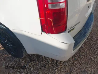2010 Dodge Grand Caravan SE with VIN 2D4RN4DE8AR402655, listed as a IAAI auction lot 41883296 with 245,961 mi miles and . Bid and sale history available at DreamBid. Image 19.