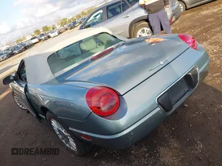 2004 Ford Thunderbird Pacific Coast Roadster with VIN 1FAHP63AX4Y107544, listed as a IAAI auction lot 41441354 with Not Provided miles and . Bid and sale history available at DreamBid. Image 3.