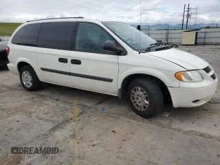2005 Dodge Caravan SE with VIN 1D4GP24R45B273262, listed as a Copart auction lot 59026005 with 215,054 mi miles and Salvage title. Bid and sale history available at DreamBid. Image 4.