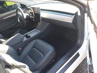 2023 Tesla Model 3 z VIN 5YJ3E1EA0PF611244, wystawiony jako IAAI lot #41455102 z przebiegiem 21 867 mil mil oraz . Historia ofert i sprzedaży dostępna na DreamBid. Obrazek 5.