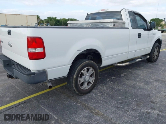 2005 Ford F-150 XL with VIN 1FTRF14W35NB42167, listed as a IAAI auction lot 41990938 with 256,964 mi miles. Bid and sale history available at carsss.com. Image 4.