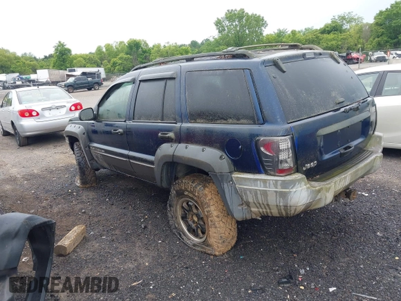 2001 Jeep Grand Cherokee Laredo z VIN 1J4GW48S91C698189, wystawiony jako IAAI lot #42315702 z przebiegiem 229 161 mil mil oraz . Historia ofert i sprzedaży dostępna na DreamBid. Obrazek 3.