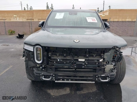 2022 Rivian R1T Adventure Package with VIN 7FCTGAAA7NN016044, listed as a IAAI auction lot 41540010 with 1 mi miles. Bid and sale history available at carsss.com. Image 12.