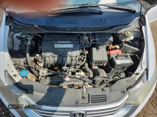 2010 Honda Insight EX с VIN JHMZE2H75AS024918, выставлен на аукционе Copart как лот 66526265 с пробегом 312 605 миль миль и Списание • Salvage title. История ставок и продаж доступна на DreamBid. Изображение 11.