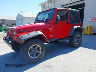 1999 Jeep Wrangler Sport with VIN 1J4FY19S0XP468304, listed as a IAAI auction lot 40038580 with 123,247 mi miles. Bid and sale history available at carsss.com. Image 17.
