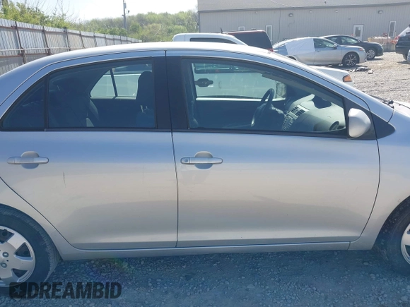 2009 Toyota Yaris with VIN JTDBT903X91301963, listed as a IAAI auction lot 42102283 with 143,966 mi miles. Bid and sale history available at carsss.com. Image 13.