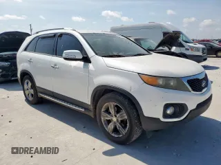 2012 Kia Sorento EX z VIN 5XYKU4A64CG271617, wystawiony jako Copart lot #64901615 z przebiegiem 127 061 mil mil oraz Czysty tytuł • Clean title. Historia ofert i sprzedaży dostępna na DreamBid. Obrazek 4.