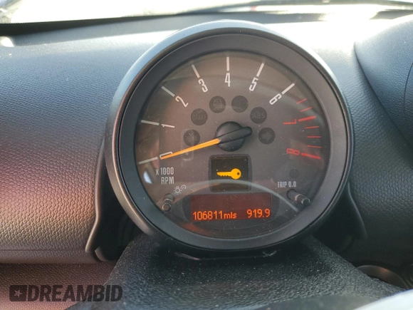 2016 MINI Countryman S with VIN WMWZC5C51GWU01290, listed as a Copart auction lot 77684384 with 106,811 mi miles and Salvage Title. Bid and sale history available at DreamBid. Image 9.