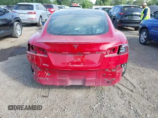 2021 Tesla Model S Plaid with VIN 5YJSA1E60MF447203, listed as a IAAI auction lot 42025120 with 58,190 mi miles. Bid and sale history available at carsss.com. Image 6.
