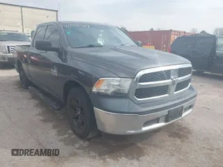 2014 Ram 1500 Tradesman with VIN 1C6RR6FG1ES332987, listed as a IAAI auction lot 41552524 with 217,684 mi miles and . Bid and sale history available at DreamBid. Image 1.