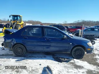2003 Mitsubishi Lancer ES with VIN JA3AJ26E13U0A3996, listed as a IAAI auction lot 41251250 with 223,311 mi miles. Bid and sale history available at carsss.com. Image 12.