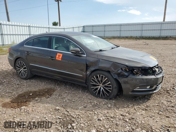 2014 Volkswagen CC VR6 Executive 4Motion with VIN WVWGU7AN9EE523145, listed as a Copart auction lot 71419134 with 94,547 mi miles and Salvage Title. Bid and sale history available at carsss.com. Image 4.