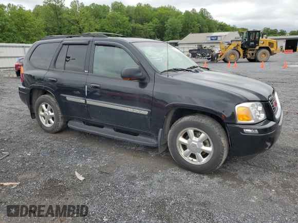 2004 GMC Envoy SLT with VIN 1GKDT13S842210243, listed as a Copart auction lot 55672595 with 148,232 mi miles and Clean Title. Bid and sale history available at DreamBid. Image 4.