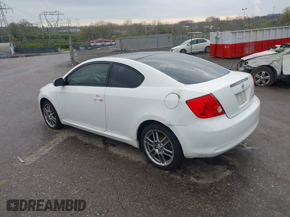 2007 Scion tC Spec with VIN JTKDE177270146530, listed as a IAAI auction lot 42033365 with 128,482 mi miles. Bid and sale history available at carsss.com. Image 3.