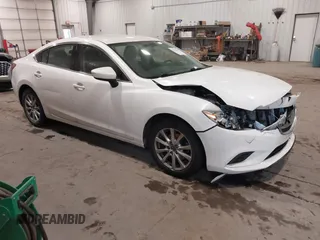 2014 Mazda 6 i Sport with VIN JM1GJ1U67E1141309, listed as a IAAI auction lot 41194457 with 120,122 mi miles and . Bid and sale history available at carsss.com. Image 1.