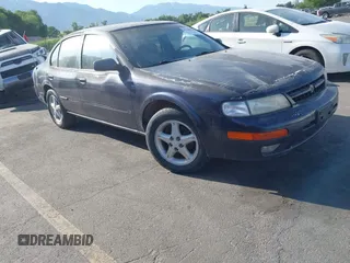 1997 Nissan Maxima GXE z VIN JN1CA21D5VT802107, wystawiony jako IAAI lot #42449306 z przebiegiem 231 564 mil mil oraz . Historia ofert i sprzedaży dostępna na DreamBid. Obrazek 1.