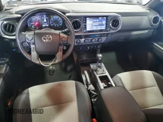 2021 Toyota Tacoma SR with VIN 3TMCZ5ANXMM425903, listed as a Copart auction lot 57963425 with 61,458 mi miles and Salvage title. Bid and sale history available at DreamBid. Image 8.