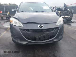 2015 Mazda 5 Sport with VIN JM1CW2BL3F0188052, listed as a IAAI auction lot 40777036 with 69,405 mi miles. Bid and sale history available at carsss.com. Image 6.