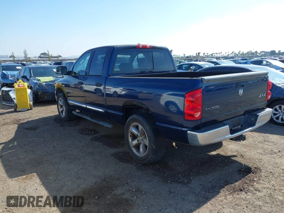 2007 Dodge 1500 SLT with VIN 1D7HU18207J606248, listed as a IAAI auction lot 42141047 with 128,821 mi miles. Bid and sale history available at carsss.com. Image 3.