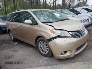 2011 Toyota Sienna XLE AAS with VIN 5TDYK3DC1BS142604, listed as a IAAI auction lot 41950599 with 185,000 mi miles. Bid and sale history available at carsss.com. Image 1.