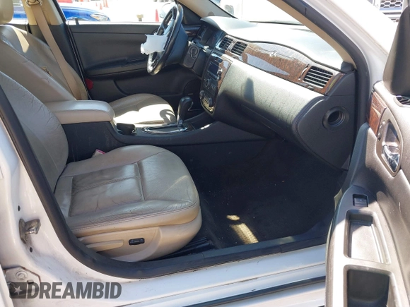 2014 Chevrolet Impala LTZ with VIN 2G1WC5E36E1182793, listed as a IAAI auction lot 41817899 with 171,776 mi miles and . Bid and sale history available at DreamBid. Image 5.