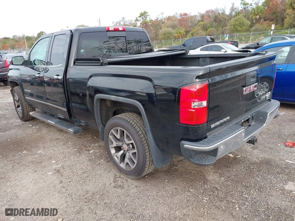 2014 GMC Sierra 1500 SLT with VIN 1GTV2VEJXEZ389280, listed as a IAAI auction lot 41370436 with 124,311 mi miles. Bid and sale history available at carsss.com. Image 3.