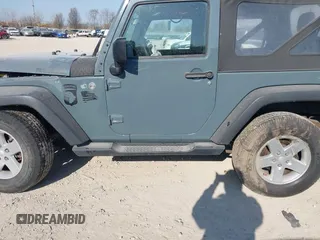 2014 Jeep Wrangler Sport with VIN 1C4AJWAG5EL271318, listed as a IAAI auction lot 41780040 with 128,942 mi miles and . Bid and sale history available at DreamBid. Image 14.