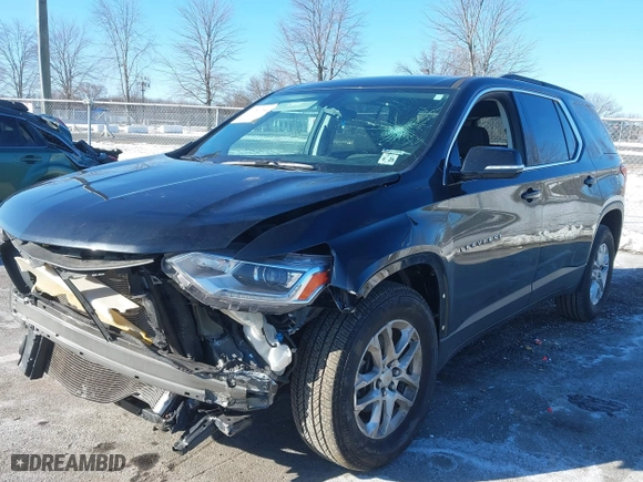 2020 Chevrolet Traverse LT Cloth with VIN 1GNEVGKWXLJ242835, listed as a IAAI auction lot 41251285 with 55,639 mi miles. Bid and sale history available at carsss.com. Image 2.