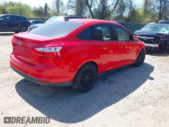 2014 Ford Focus SE with VIN 1FADP3F2XEL164830, listed as a IAAI auction lot 42073107 with 164,519 mi miles. Bid and sale history available at carsss.com. Image 4.